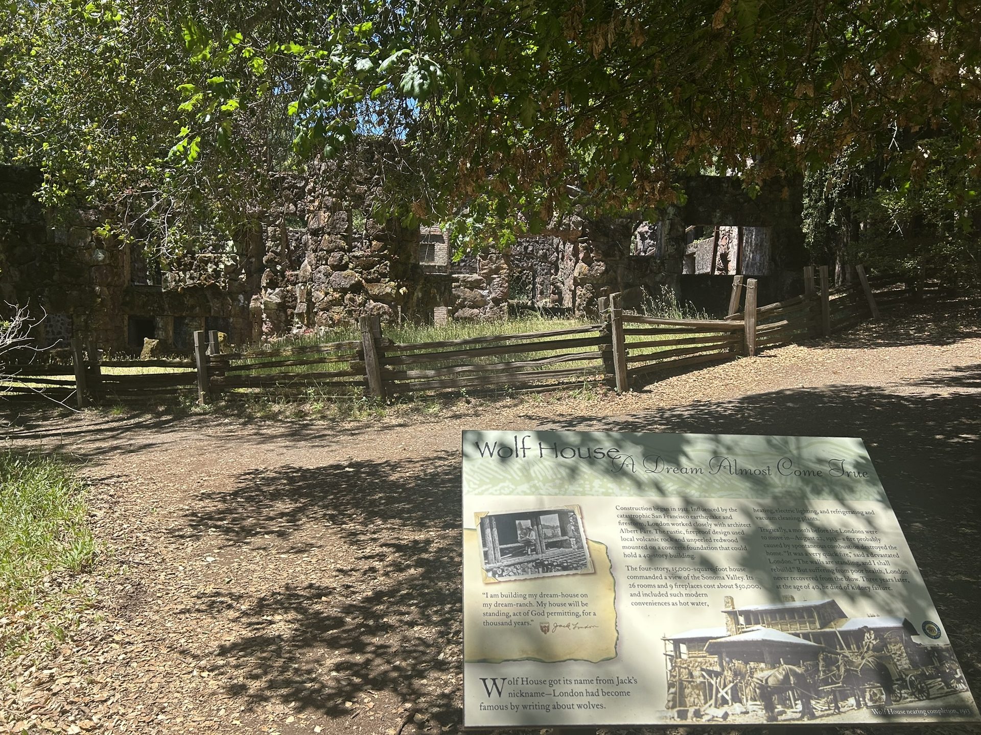 Wolf House ruins with interpretive sign